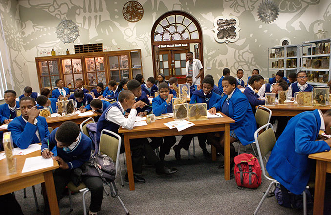 Photograph of main teaching room in PLC showing art and mural