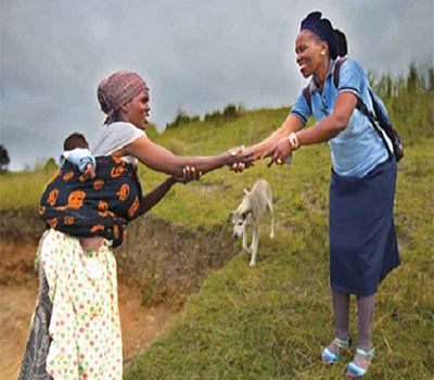 Two women helping each other