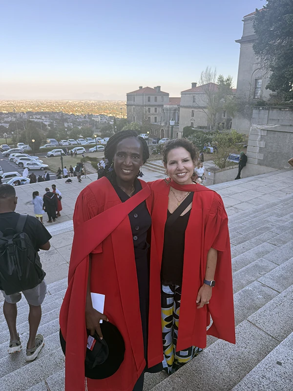 Image of two graduates