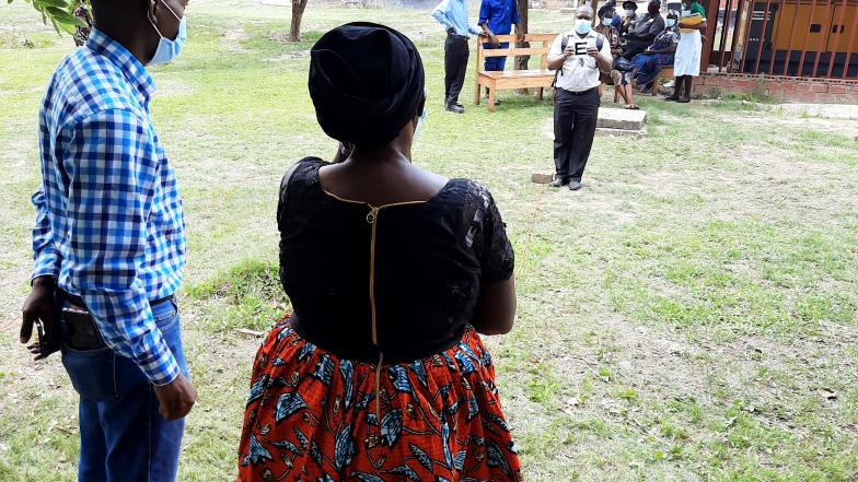 People being tested for visual acuity.