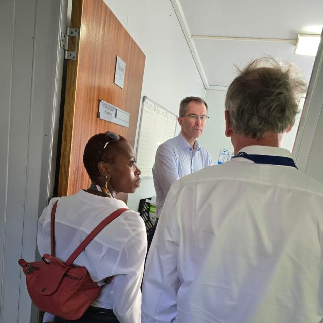 Lele Rangaka, Robert J Wilkinson and John-Arne Rottingen at the clinic