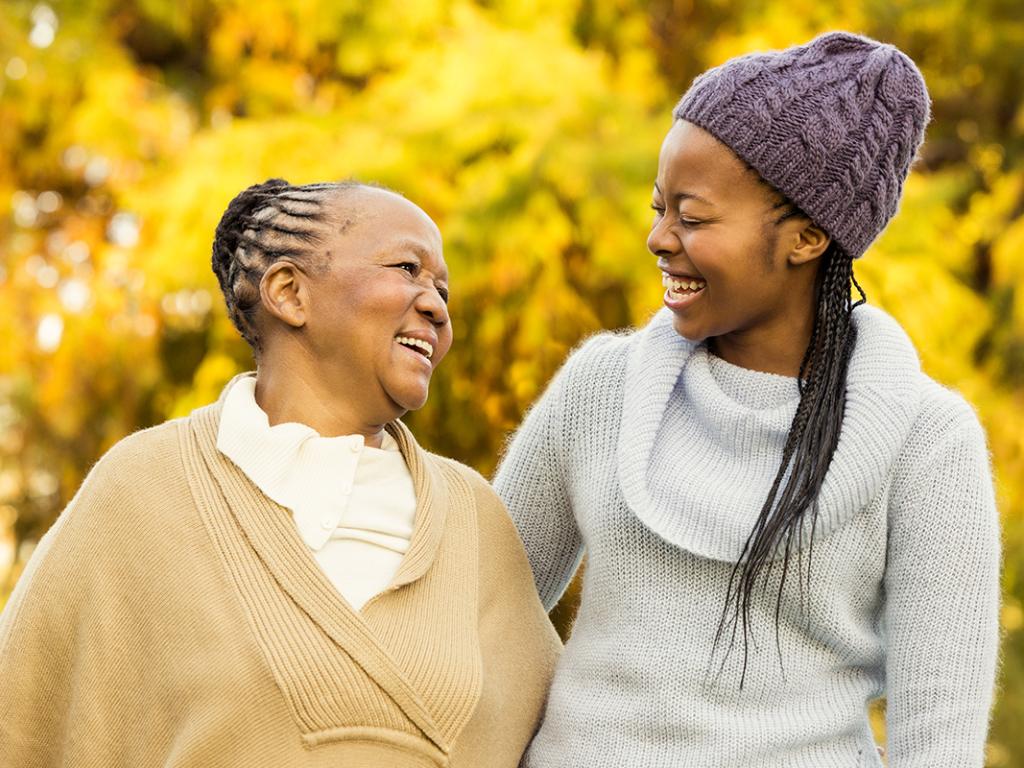 Mother and grandmother smiling to each other