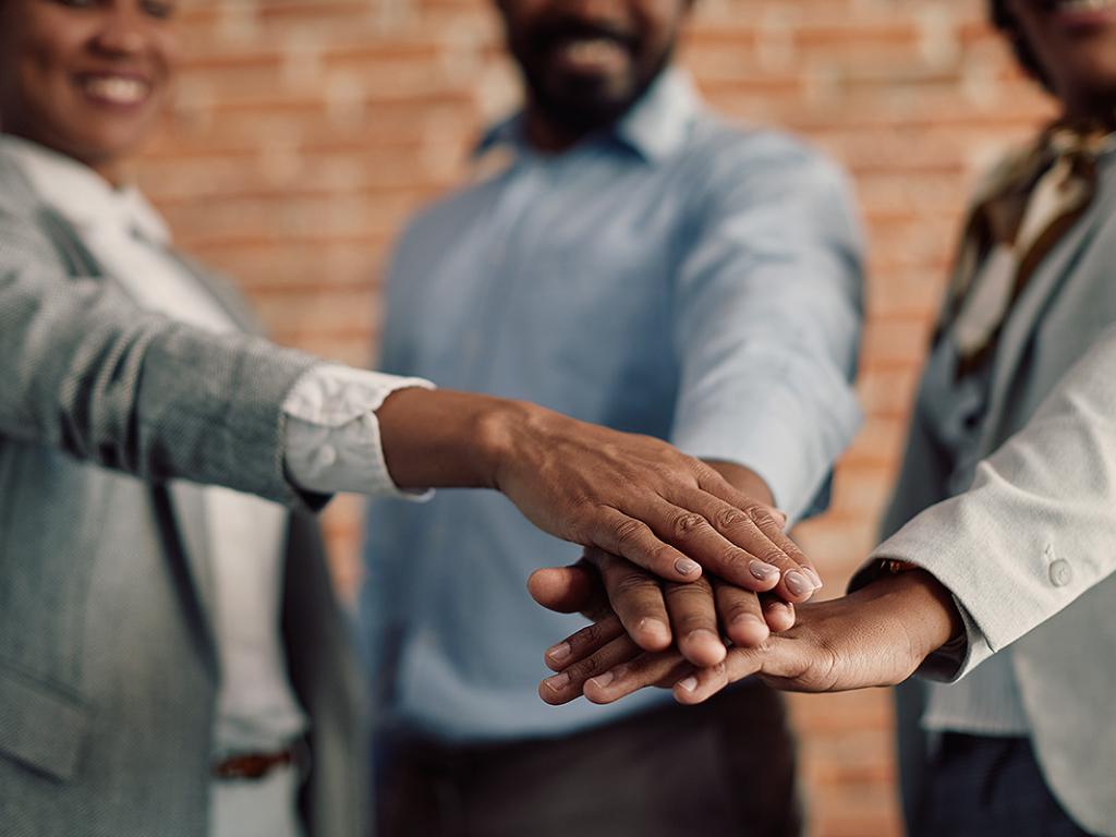 People uniting their hands